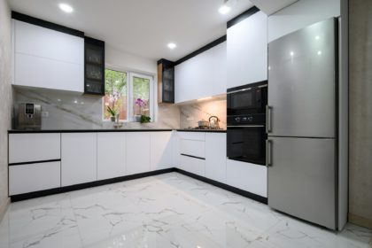 A recently renovated kitchen with sleek, modern appliances